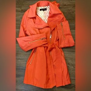 This Black Rivet White Long Trench Coat with Removable Hood